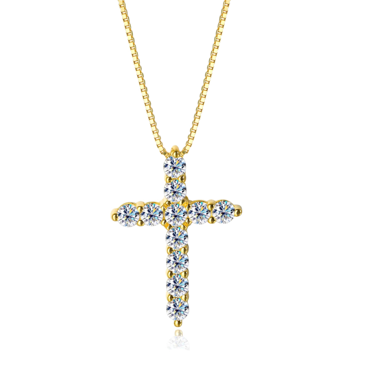 Gold cross necklace with clear stones on a white background